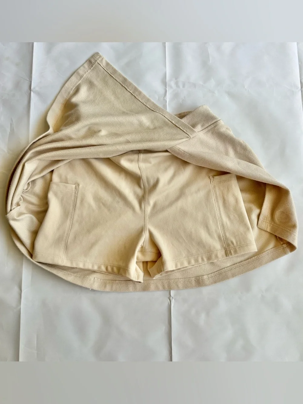 PINK Victoria’s Secret beige mini skirt, size xsmall